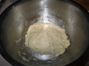 Naan dough with minced garlic kneaded in